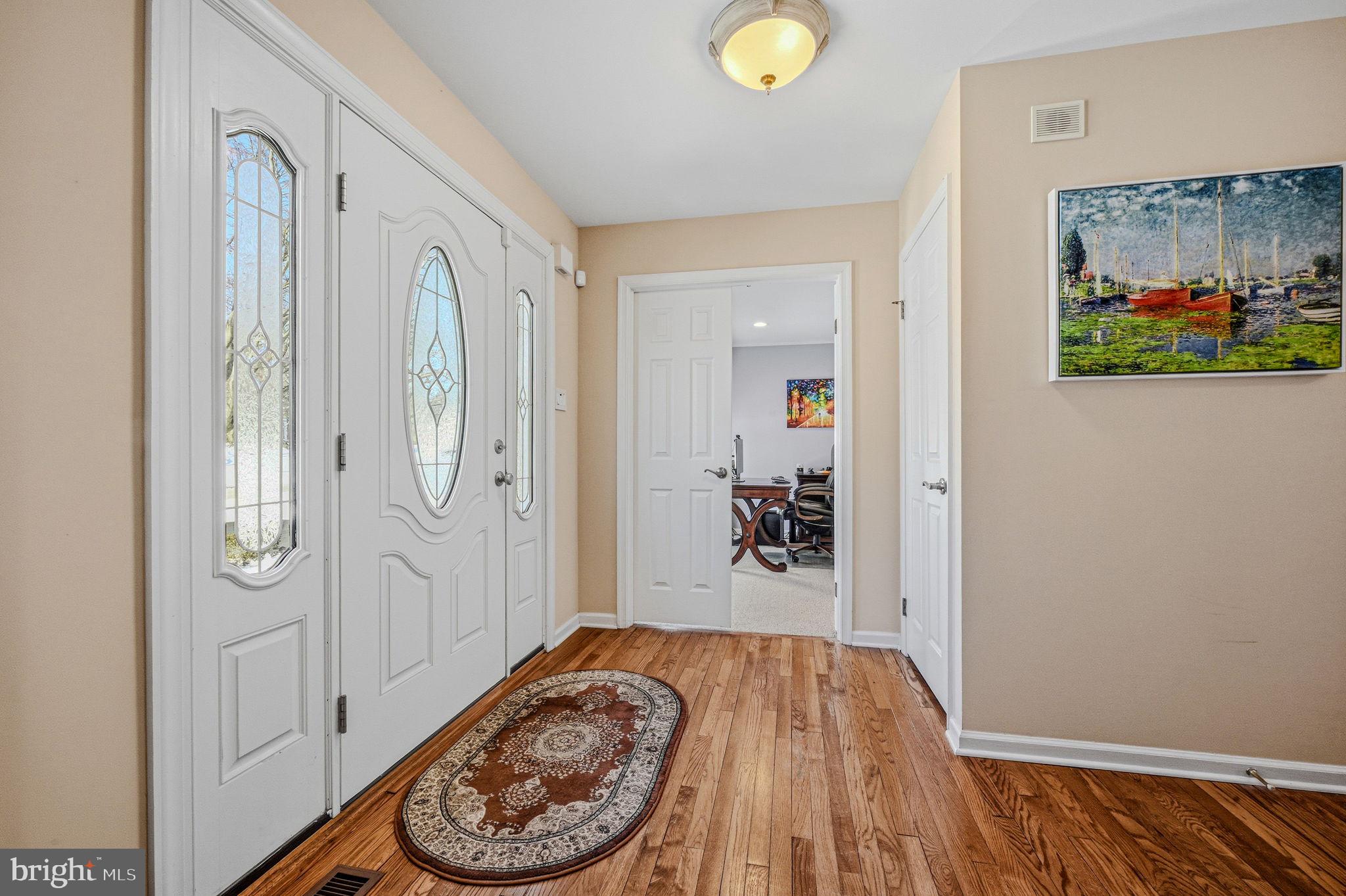 10 Auspice Circle Newark, DE 19711 - Photo 4 of 42 a view of a room with wooden floor and bathroom