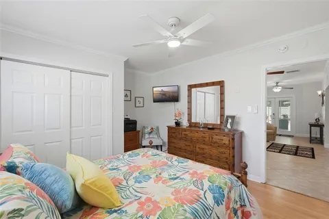 a bedroom with a bed and furniture