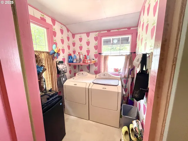 a view of a storage and utility room with a window