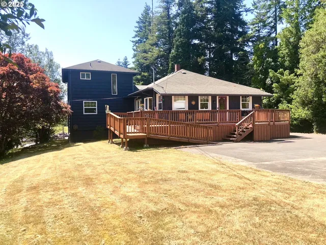 a black and white photo of a house