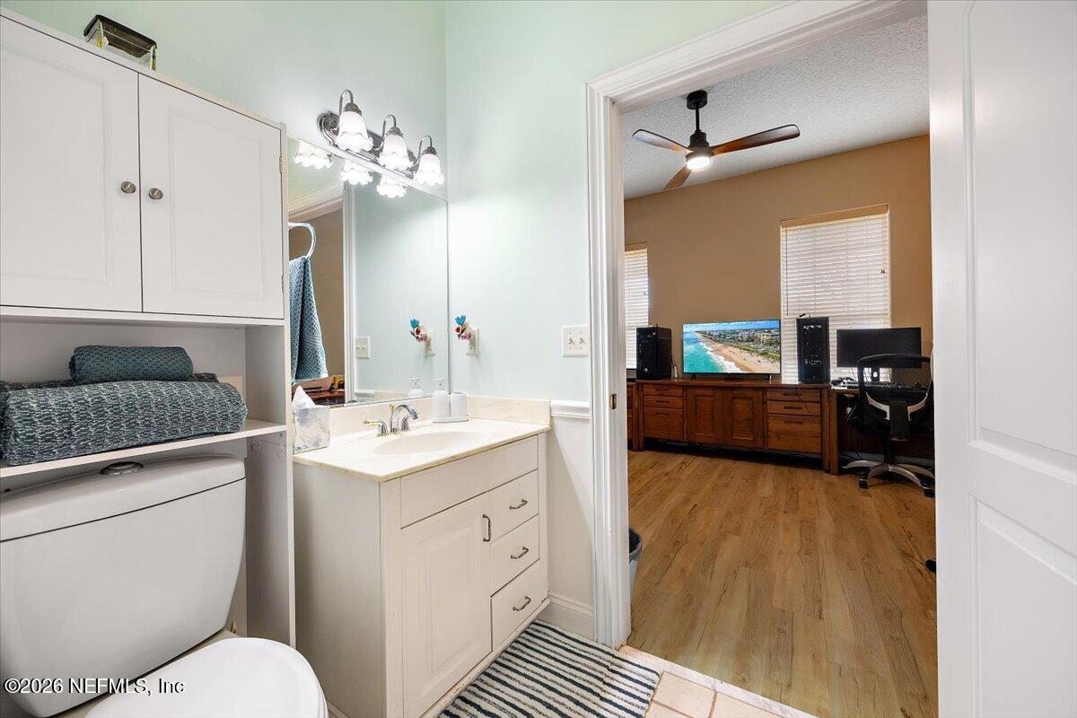 14394 Bob Burnsed Road Glen St. Mary, FL 32040 - Photo 24 of 53 a bathroom with a sink double vanity granite and a toilet