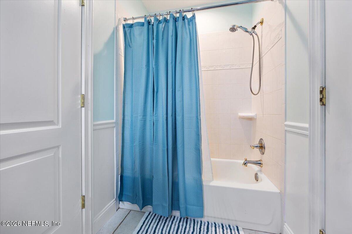 14394 Bob Burnsed Road Glen St. Mary, FL 32040 - Photo 25 of 53 a bathroom with a shower and a sink