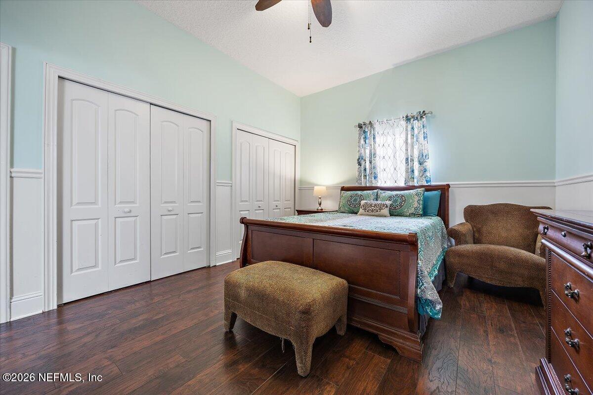 14394 Bob Burnsed Road Glen St. Mary, FL 32040 - Photo 26 of 53 a room with a couch and wooden floor