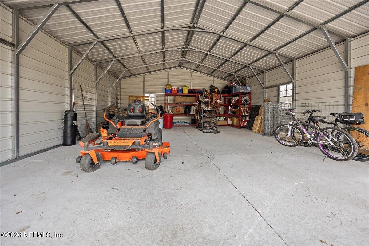 14394 Bob Burnsed Road Glen St. Mary, FL 32040 - Photo 45 of 53 a view of a garage with furniture