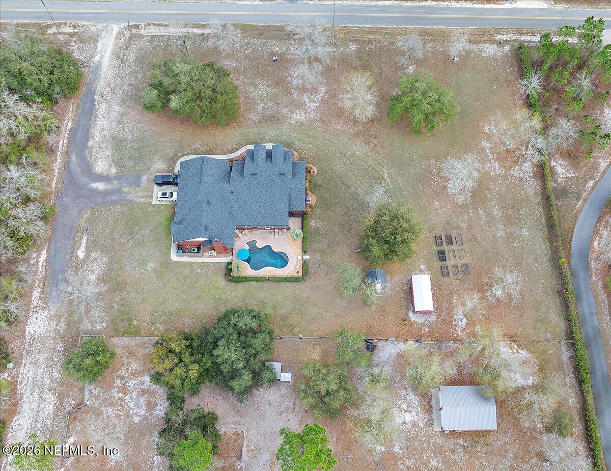 14394 Bob Burnsed Road Glen St. Mary, FL 32040 - Photo 49 of 53 an aerial view of residential house with outdoor space