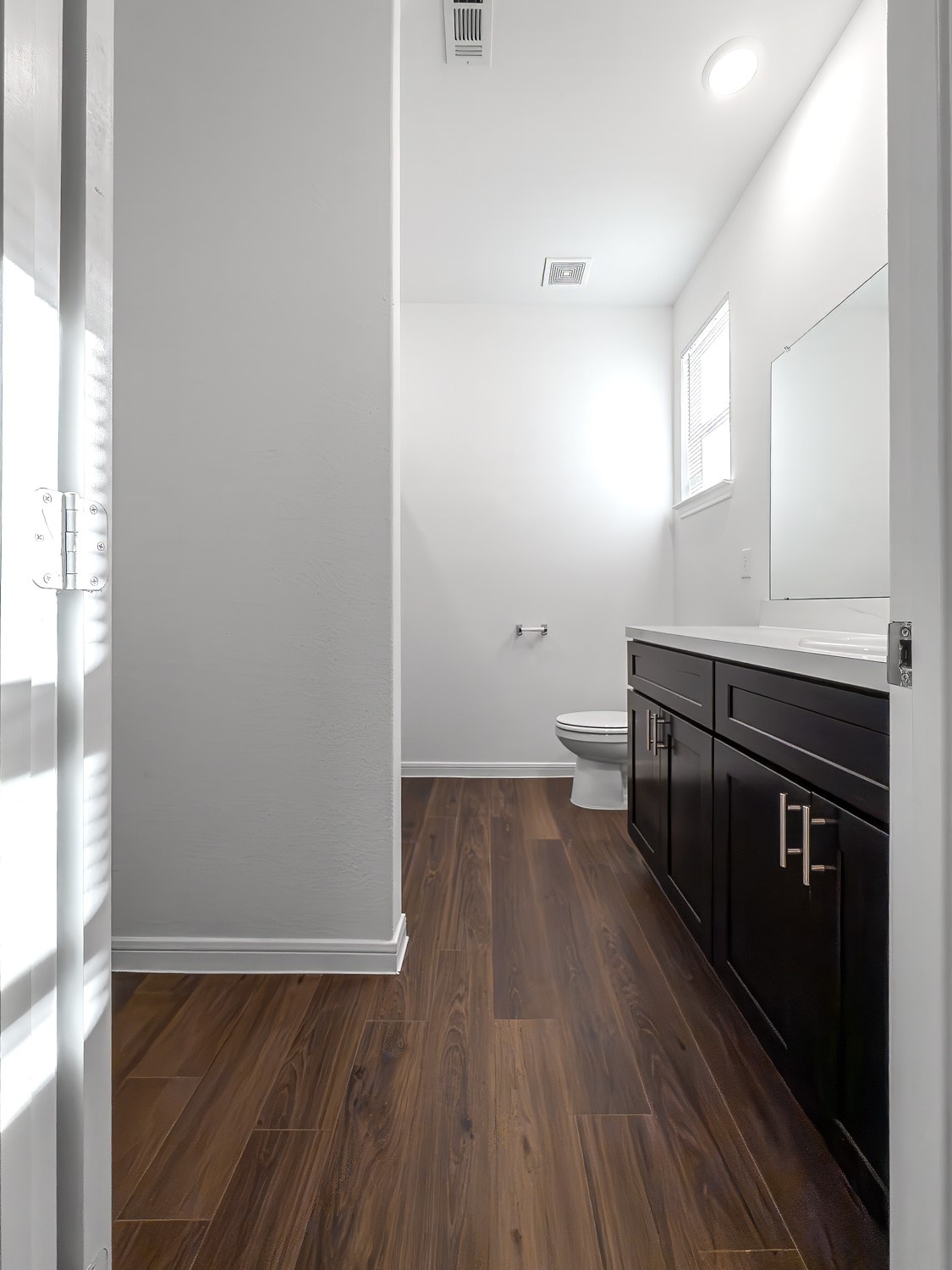 10222 Clearwick Street Houston, TX 77034 - Photo 25 of 28 a kitchen with a sink and wooden floor