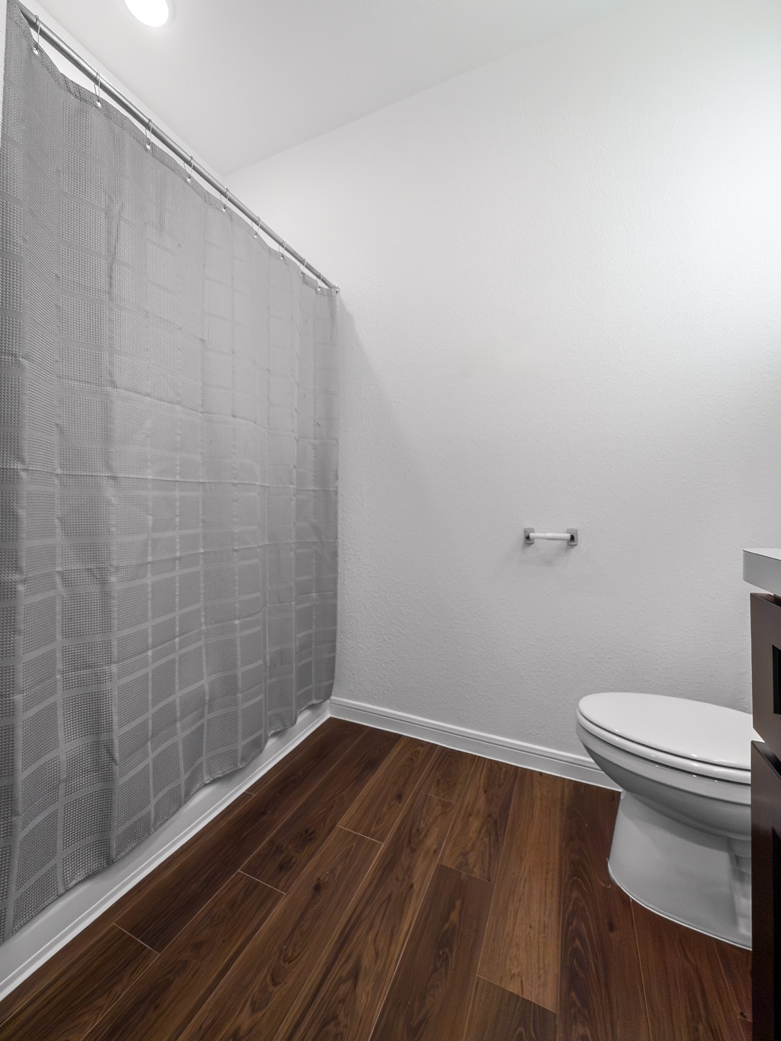 10222 Clearwick Street Houston, TX 77034 - Photo 26 of 28 a bathroom with a toilet and a shower