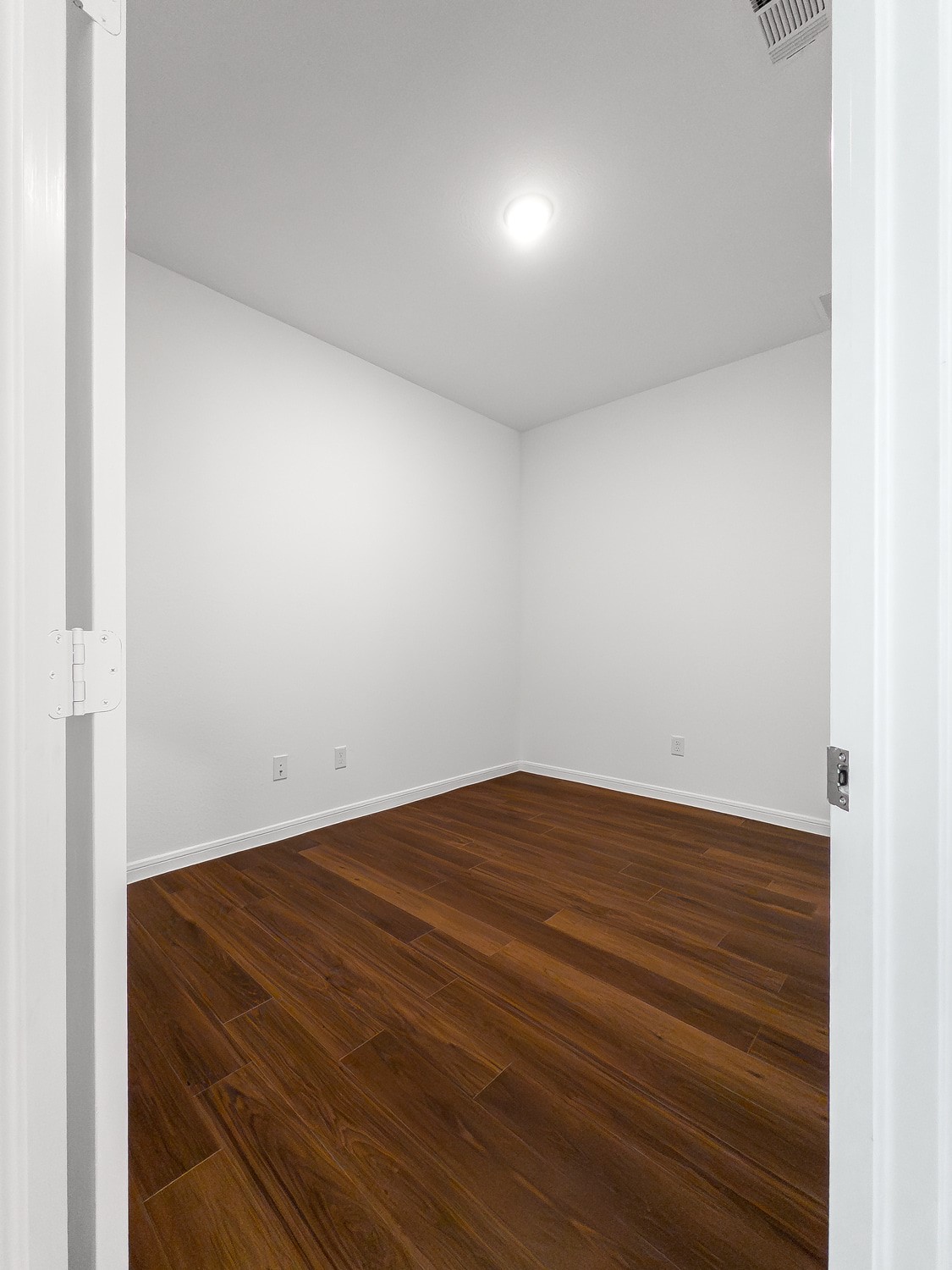 10222 Clearwick Street Houston, TX 77034 - Photo 6 of 28 a view of room with wooden floor