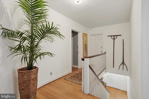 a bedroom with bed and window