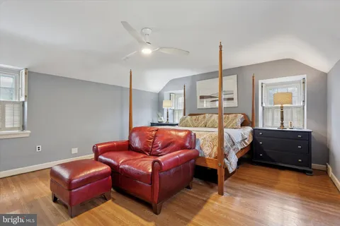 a backyard of a house with outdoor seating