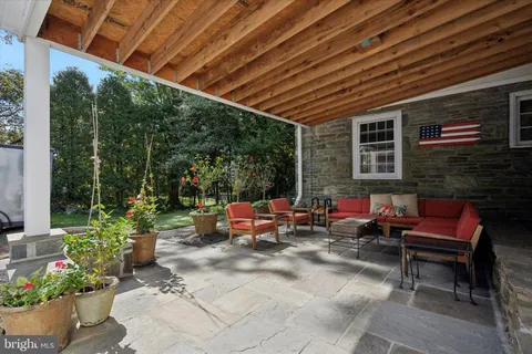 a dining room with furniture mountain view and a fireplace