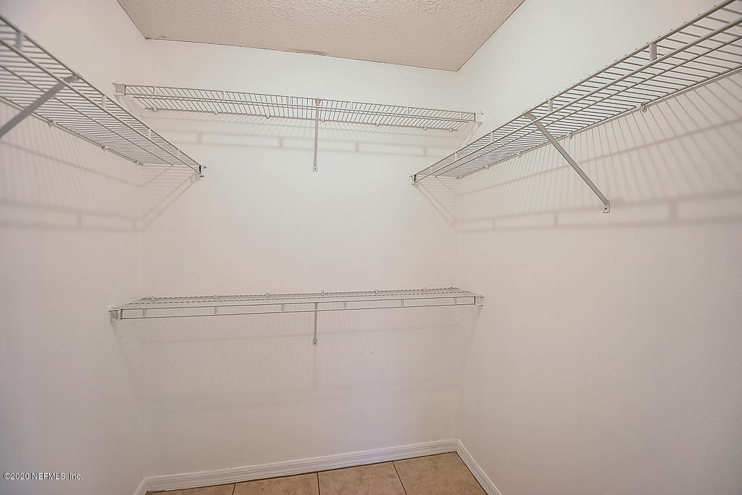 115 Beechwood Road St. Augustine, FL 32086 - Photo 13 of 28 a view of a room with racks on the wall