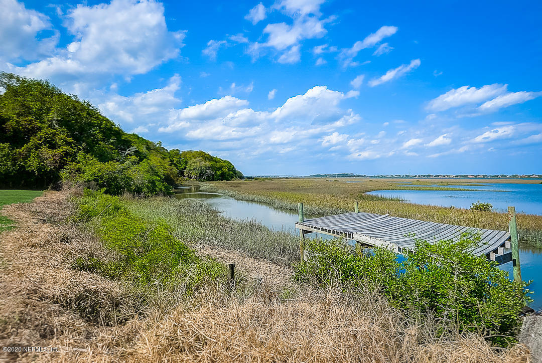 115 Beechwood Road St. Augustine, FL 32086 - Photo 26 of 28 a view of an ocean and beach