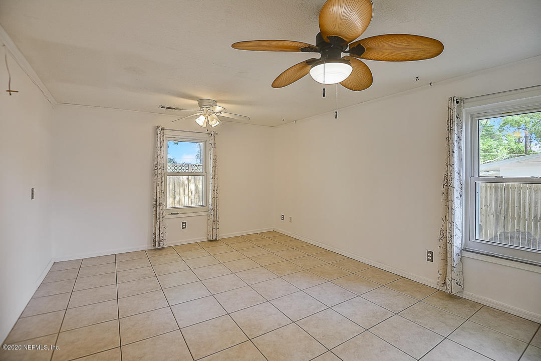 115 Beechwood Road St. Augustine, FL 32086 - Photo 10 of 28 a view of an empty room with a window