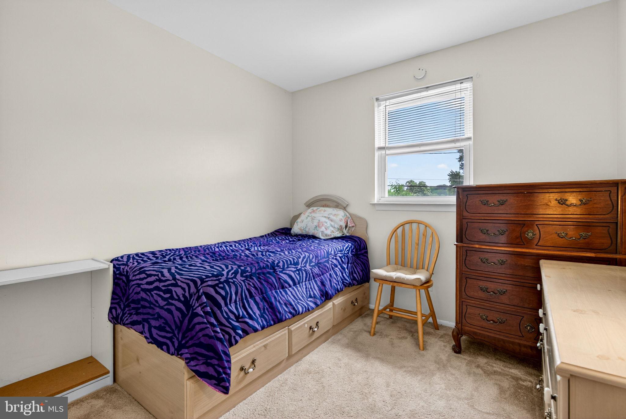 46 Trinity Avenue Marlton, NJ 08053 - Photo 16 of 37 a bedroom with a bed and a dresser