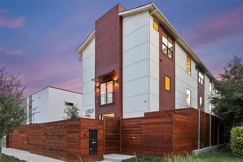 a view of a house with a street