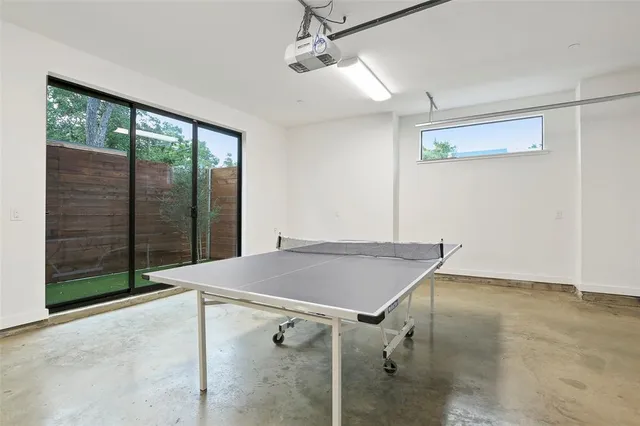 a room with a table and window