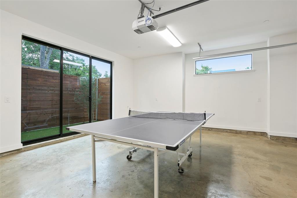 2307 Kirby Street, Unit B Dallas, TX 75204 - Photo 24 of 28 a room with a table and window