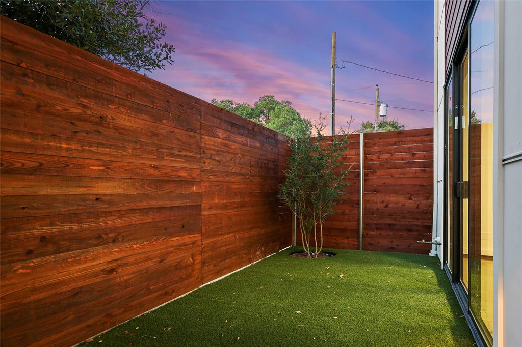 2307 Kirby Street, Unit B Dallas, TX 75204 - Photo 25 of 28 a view of a back yard