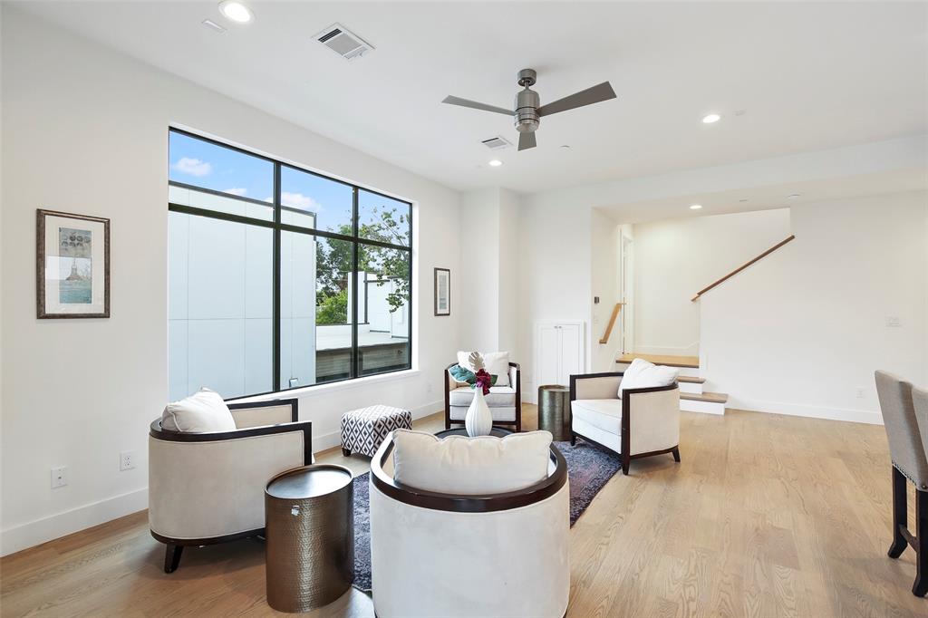2307 Kirby Street, Unit B Dallas, TX 75204 - Photo 5 of 28 a living room with furniture a window and a ceiling fan
