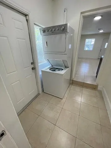 a bathroom with a sink a toilet and a shower