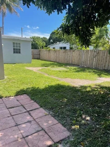 a view of a backyard with a garden