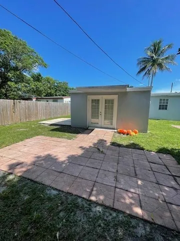 a view of backyard with green space