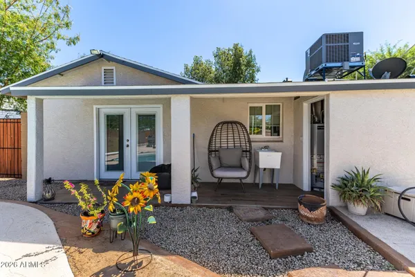 a front view of a house with patio