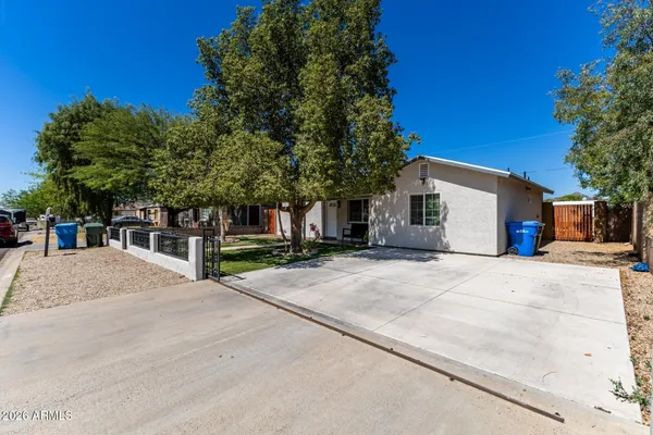 a house with trees in front of it