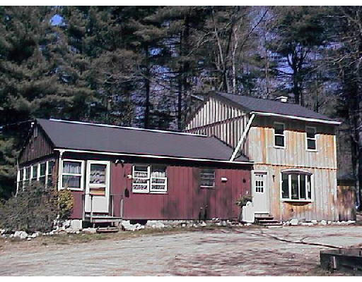 147 NW Road Westhampton, MA 01027 - Photo 1 of 1 a front view of a house with a yard