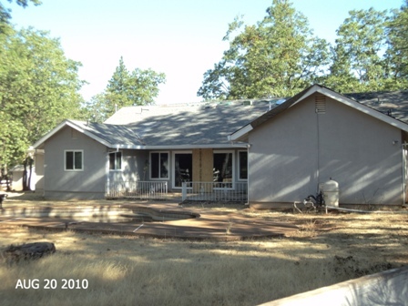 10780 Blue Mountain Ranch Road Whitmore, CA 96096 - Photo 1 of 12 a view of a house with a yard