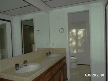 10780 Blue Mountain Ranch Road Whitmore, CA 96096 - Photo 7 of 12 a bathroom with a sink and a mirror