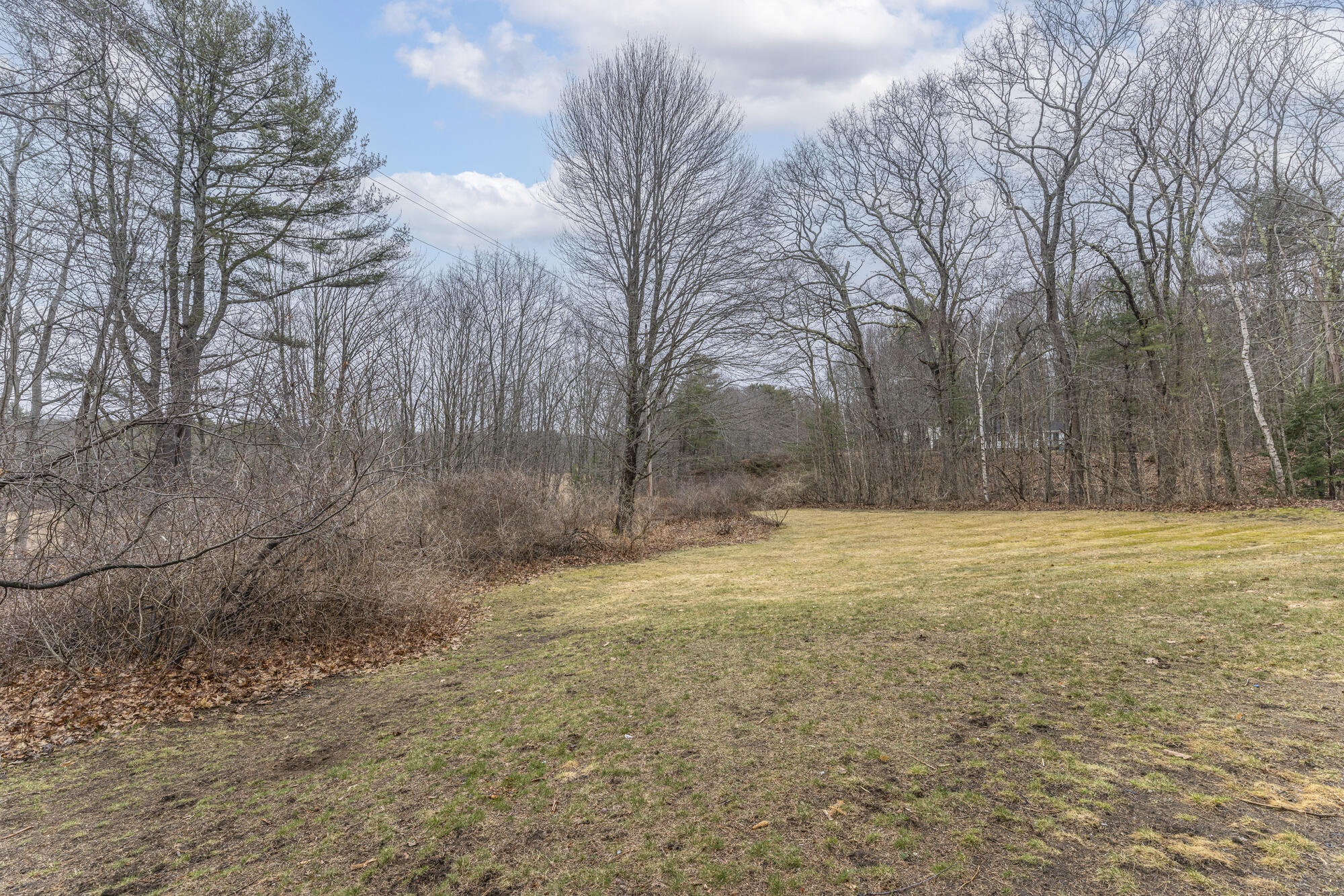 60 Brown Street, Unit 17 Kennebunk, ME 04043 - Photo 33 of 37 Back yard next to Mousam River