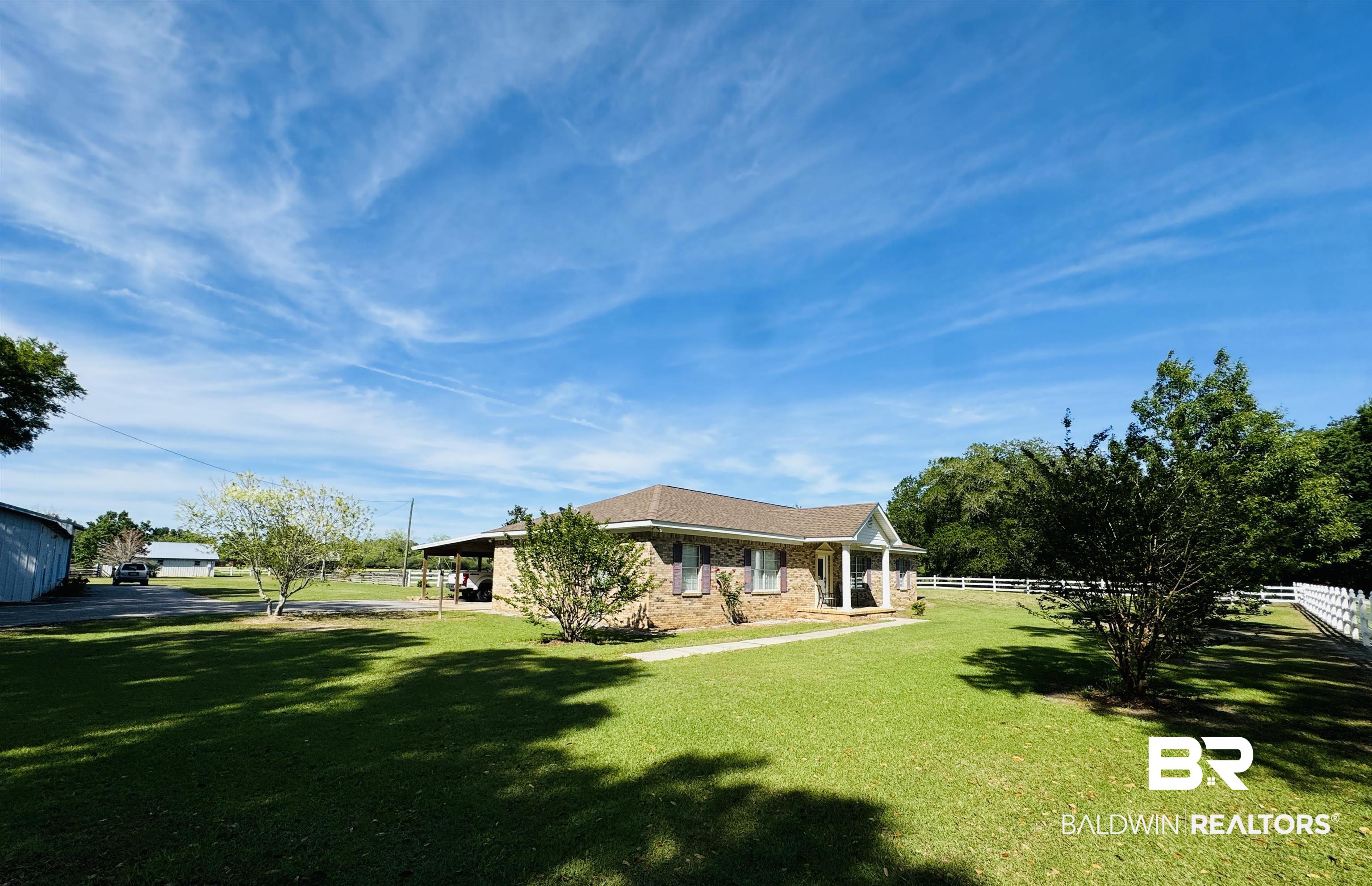 13795 White Road Silverhill, AL 36576 - Photo 14 of 99 View of yard featuring covered porch