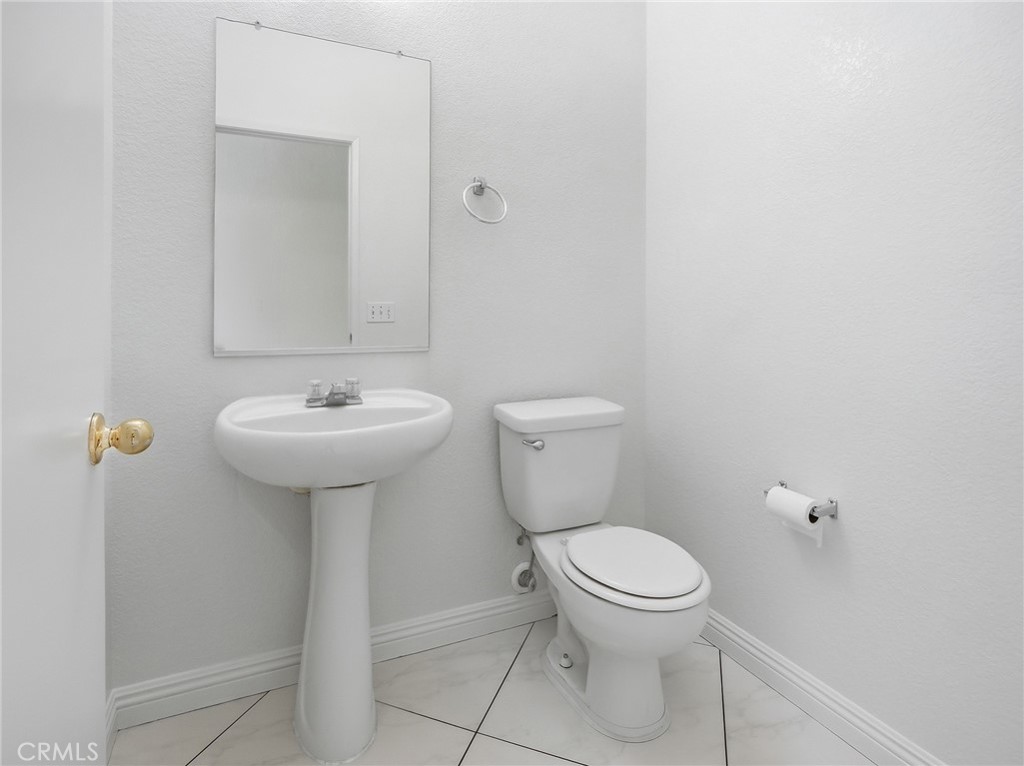 15689 Swan Road Fontana, CA 92337 - Photo 23 of 35 Powder Room downstairs