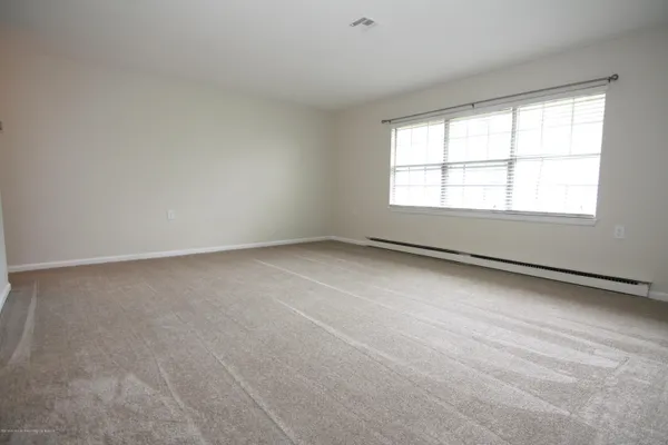 $179,000 | 463 D Portsmouth Drive, Unit 1004, Lakewood, NJ 08701