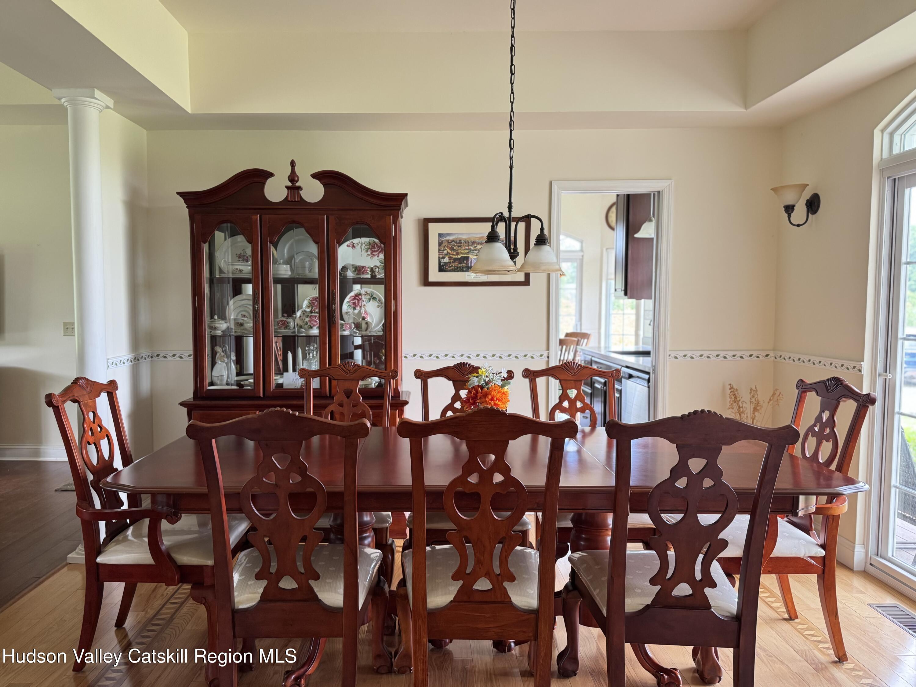 2914 Sleepy Hollow Road Athens, NY 12015 - Photo 16 of 39 a view of a dining room with furniture and wooden floor