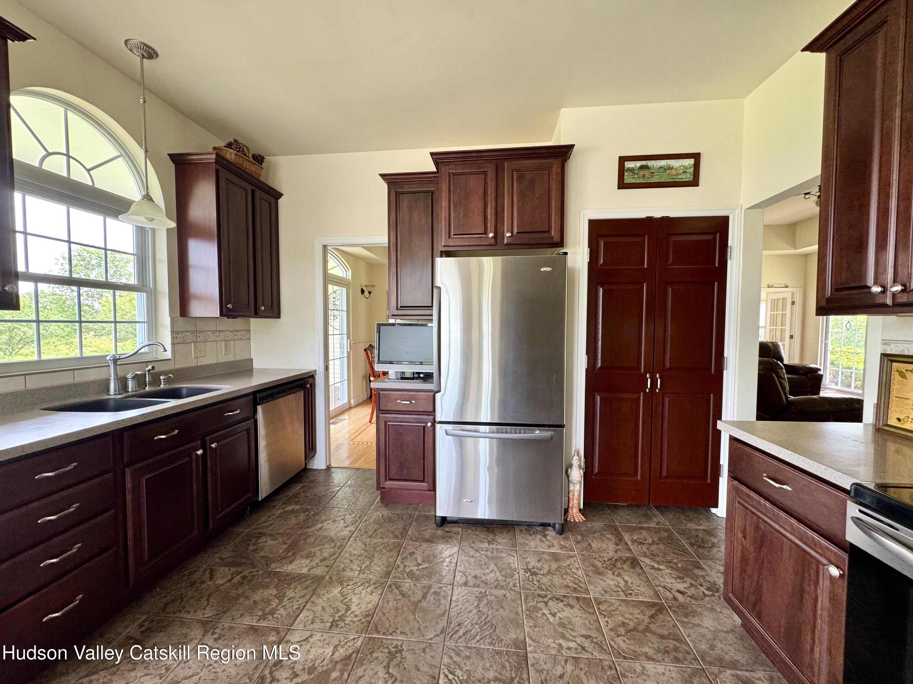 2914 Sleepy Hollow Road Athens, NY 12015 - Photo 17 of 39 a kitchen with stainless steel appliances granite countertop a refrigerator stove and sink