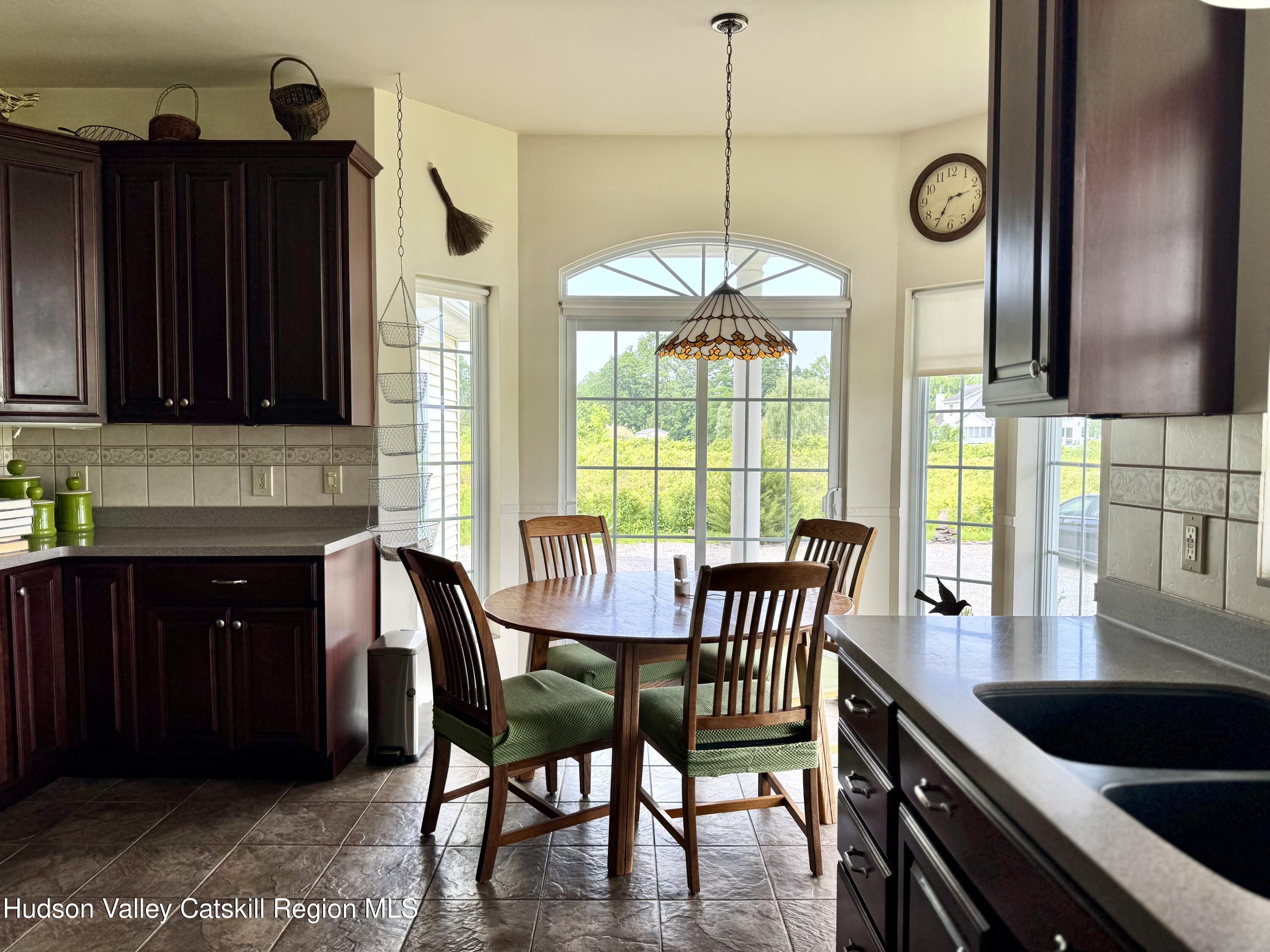 2914 Sleepy Hollow Road Athens, NY 12015 - Photo 18 of 39 a view of a dining room with furniture window and outside view