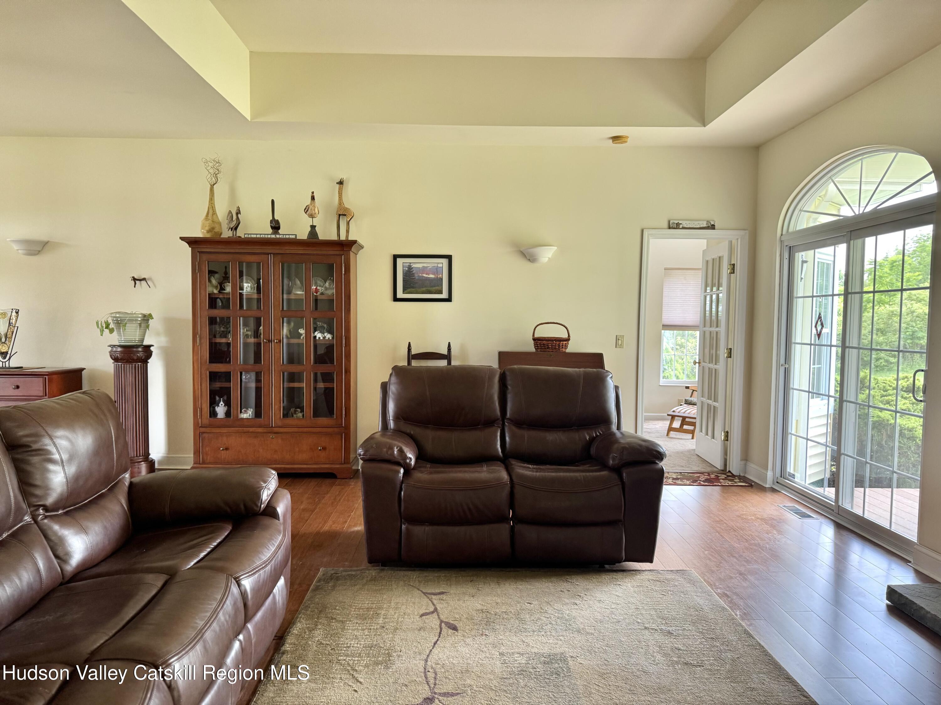 2914 Sleepy Hollow Road Athens, NY 12015 - Photo 22 of 39 a living room with furniture and wooden floor