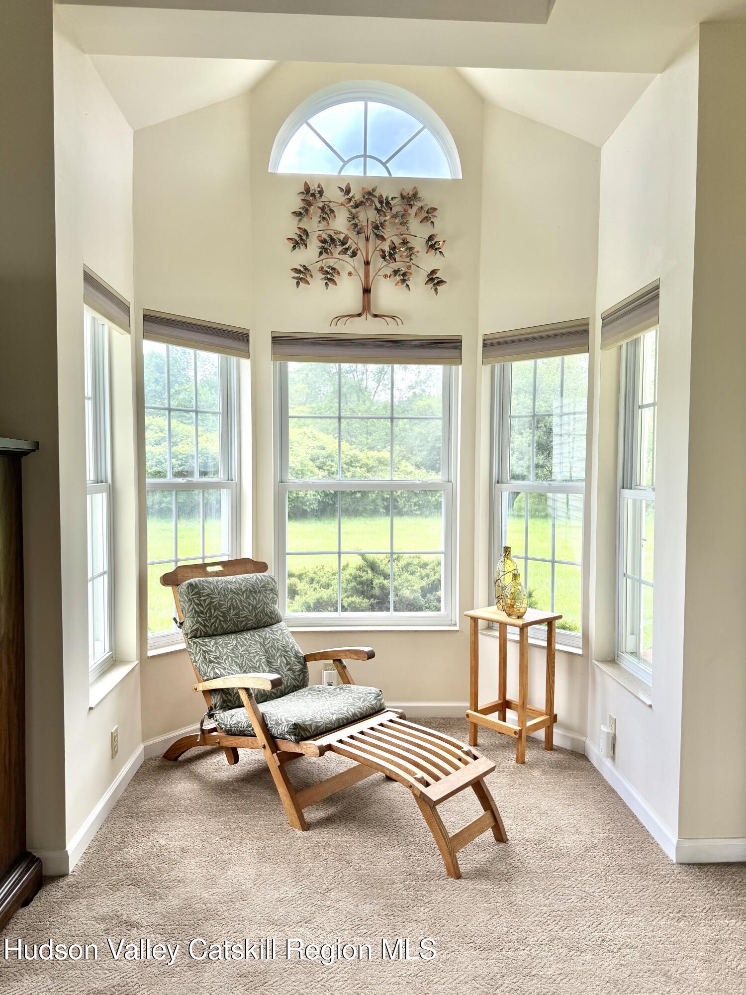 2914 Sleepy Hollow Road Athens, NY 12015 - Photo 25 of 39 a living room with furniture and a large window