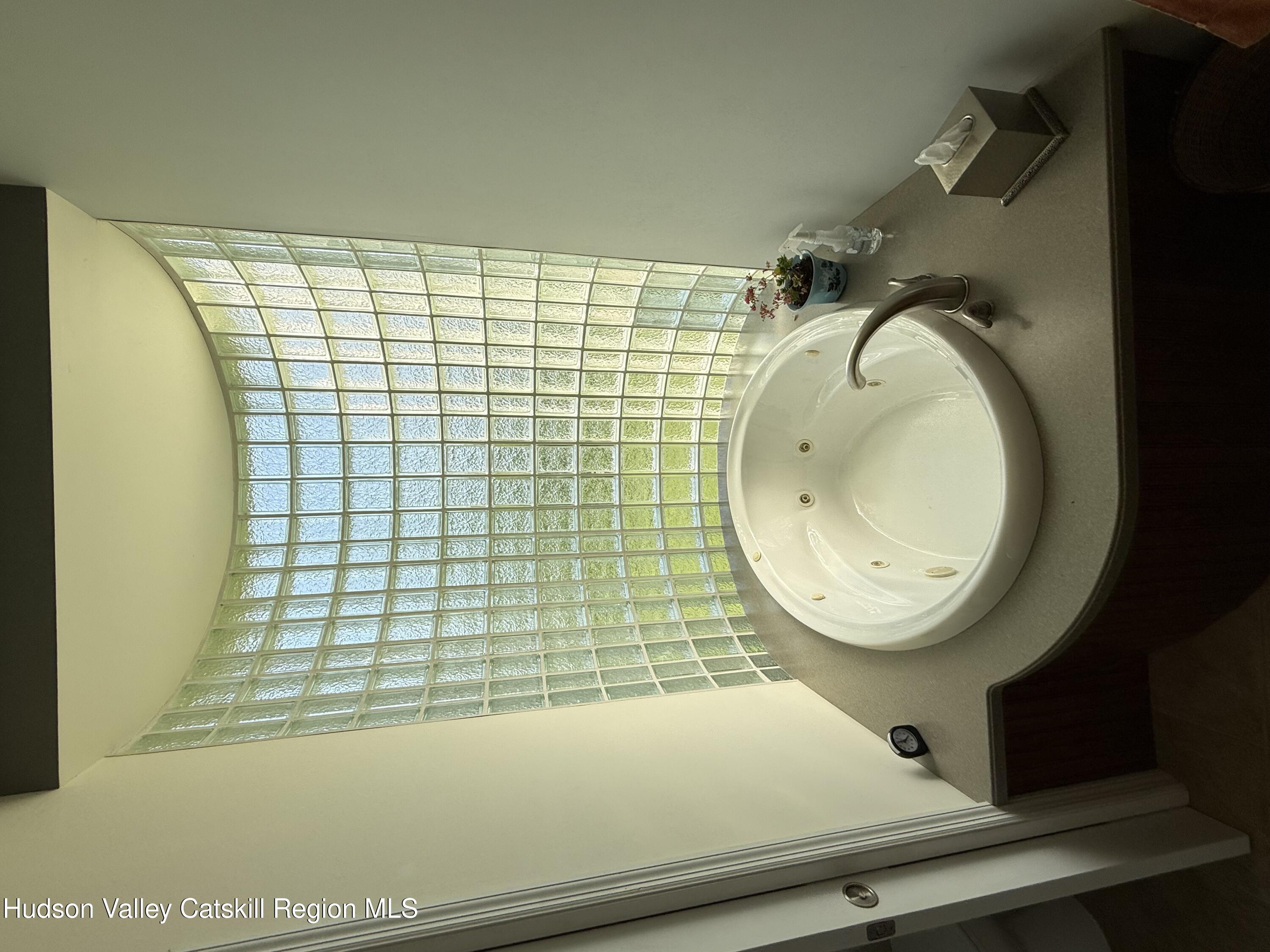2914 Sleepy Hollow Road Athens, NY 12015 - Photo 27 of 39 a bathroom with a sink and a mirror