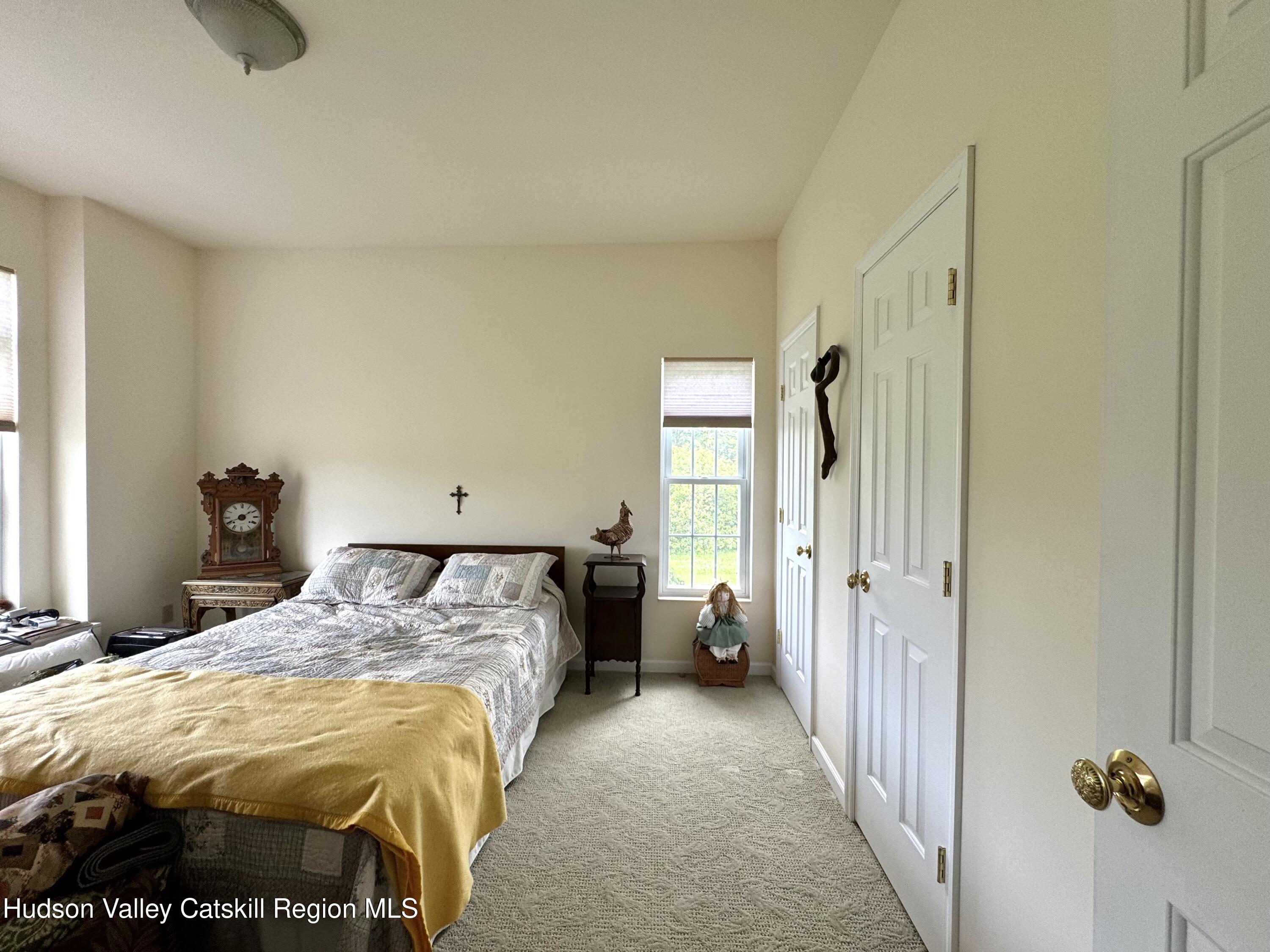 2914 Sleepy Hollow Road Athens, NY 12015 - Photo 28 of 39 a bedroom with a bed and a window