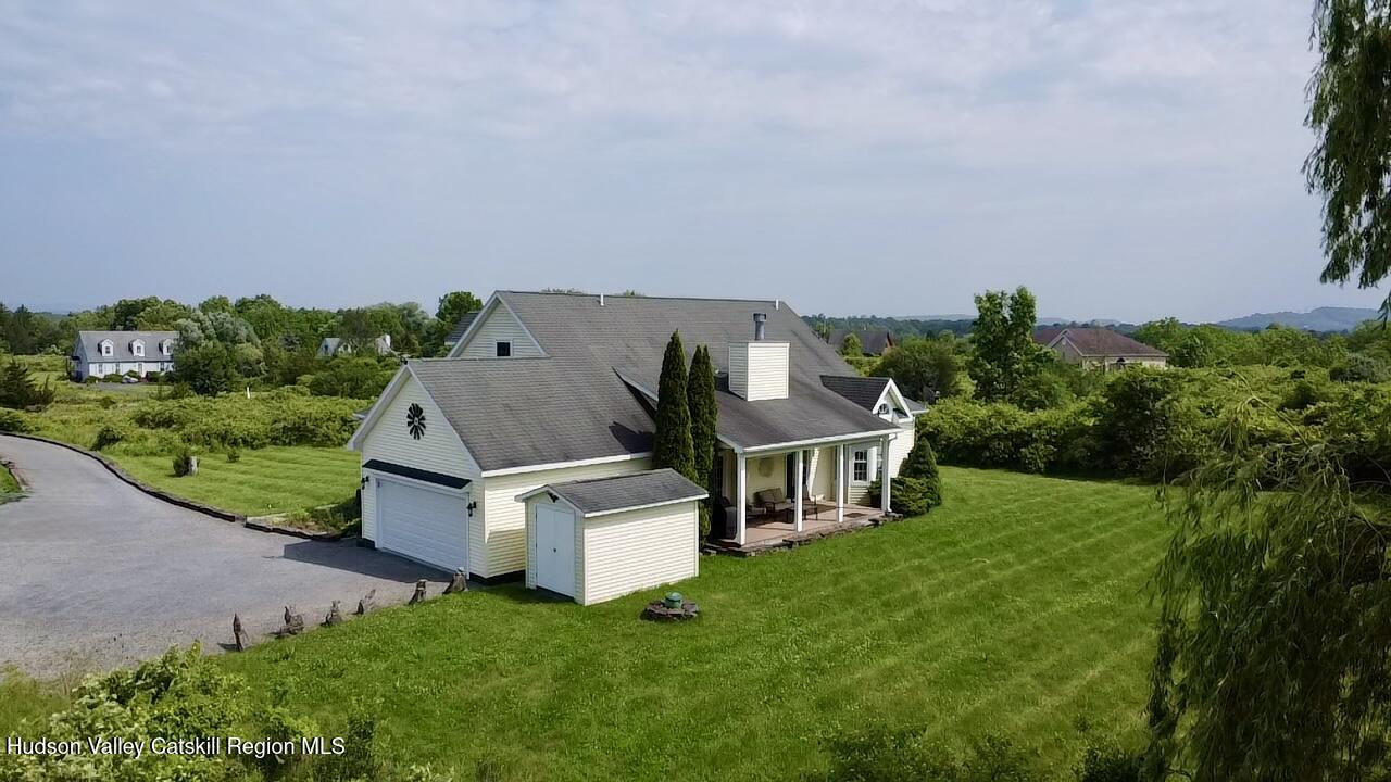 2914 Sleepy Hollow Road Athens, NY 12015 - Photo 4 of 39 an aerial view of a house with garden space and a bench