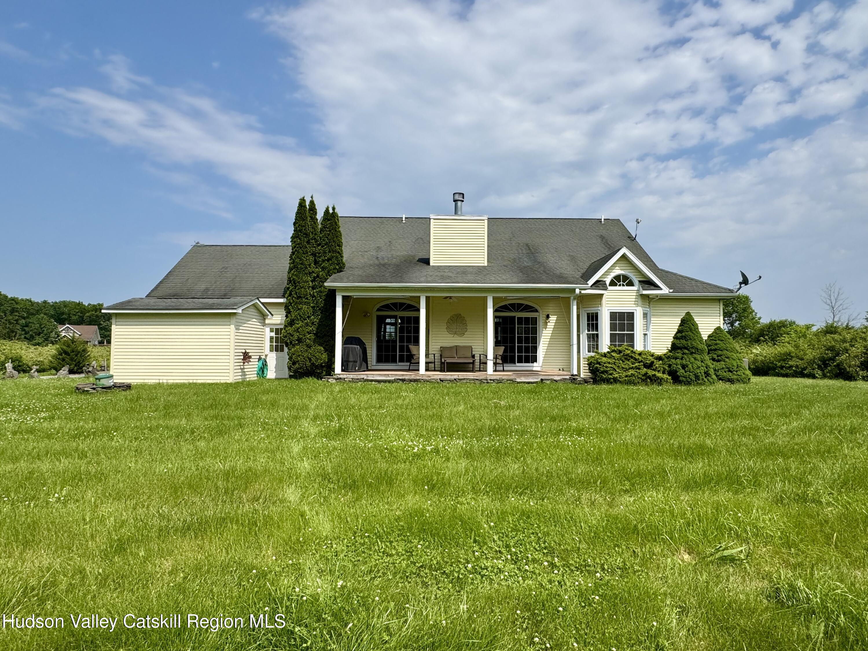 2914 Sleepy Hollow Road Athens, NY 12015 - Photo 5 of 39 a front view of a house with a yard