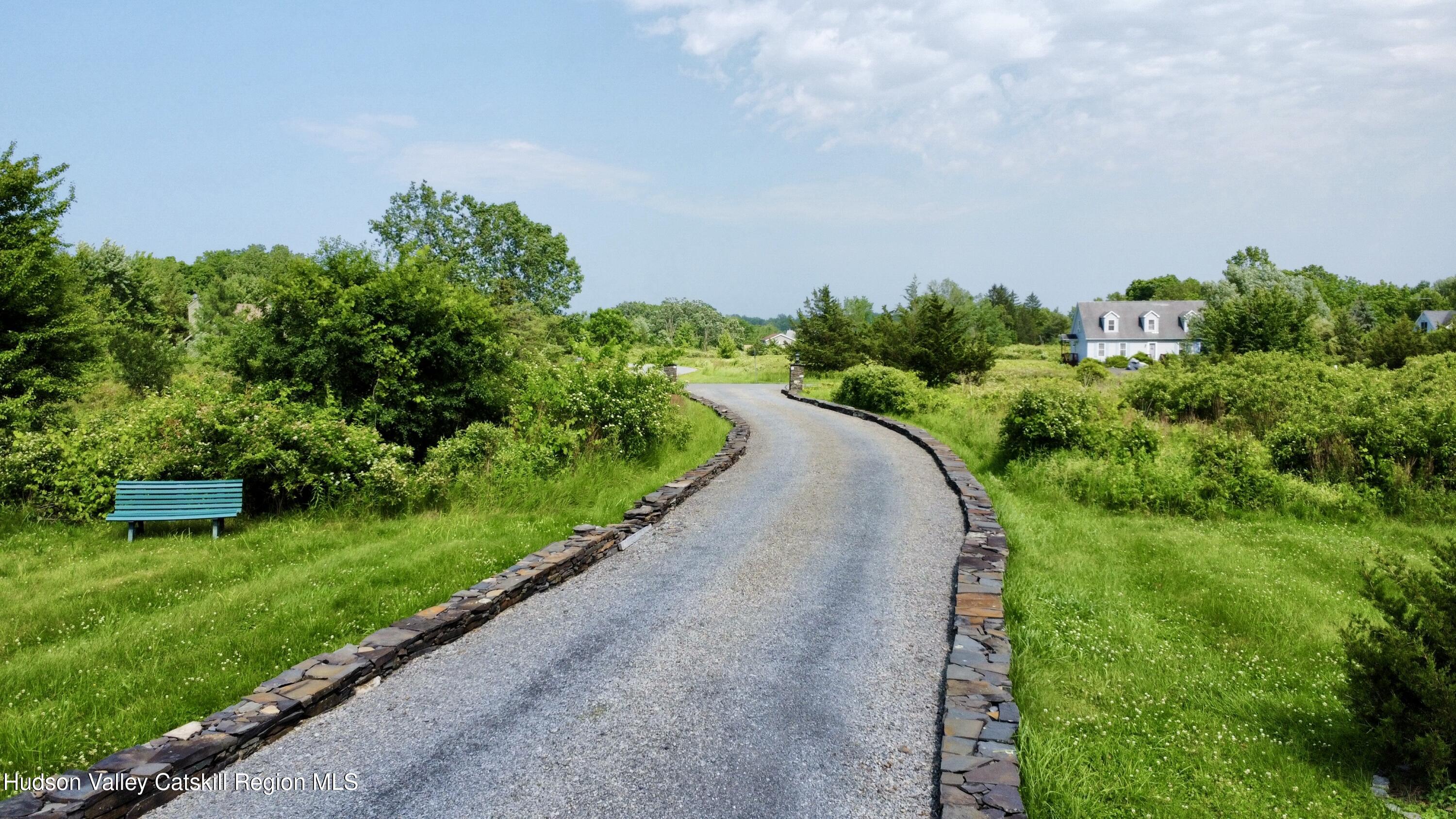 2914 Sleepy Hollow Road Athens, NY 12015 - Photo 8 of 39 a view of a garden with a building in the background