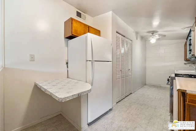 a view of kitchen and utility room