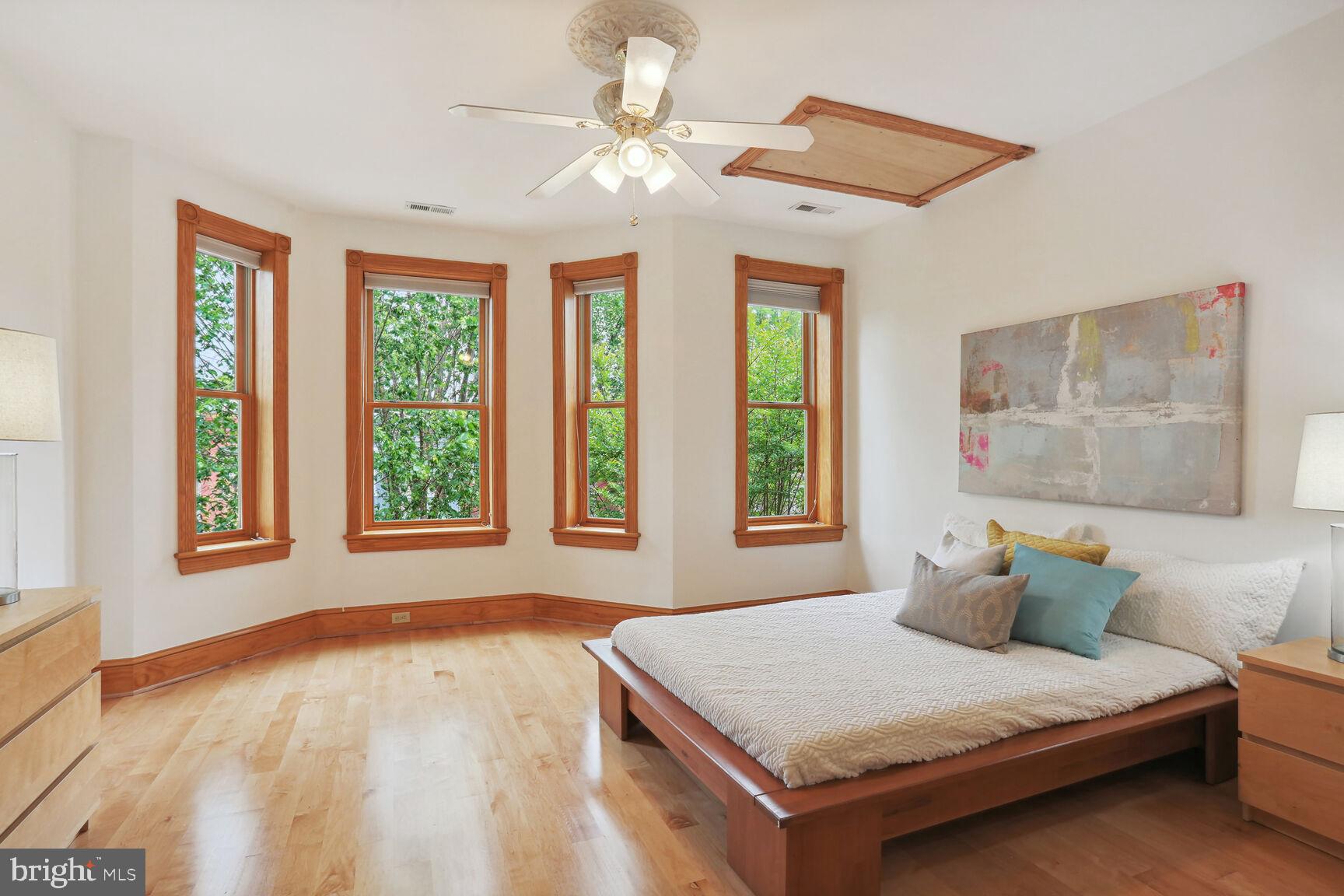 1219 Constitution Avenue Northeast Washington, DC 20002 - Photo 9 of 38 Primary bedroom W/bay windows maple wood floors