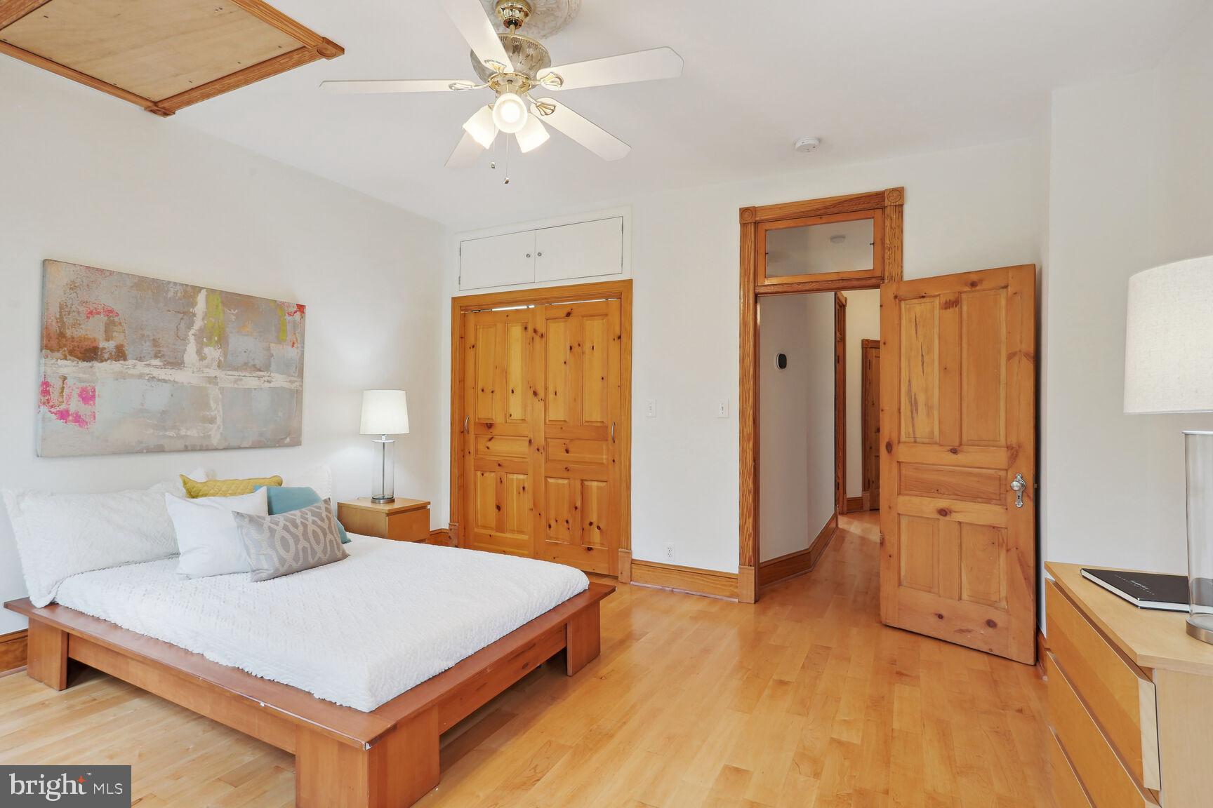 1219 Constitution Avenue Northeast Washington, DC 20002 - Photo 10 of 38 Primary bedroom w/ gleaming wood floors