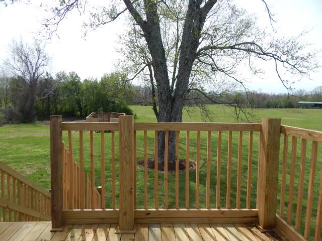 321 Hennessee Bridge Road Rock Island, TN 38581 - Photo 14 of 22 New deck overlooking back yard and adjoins Master BR/great room